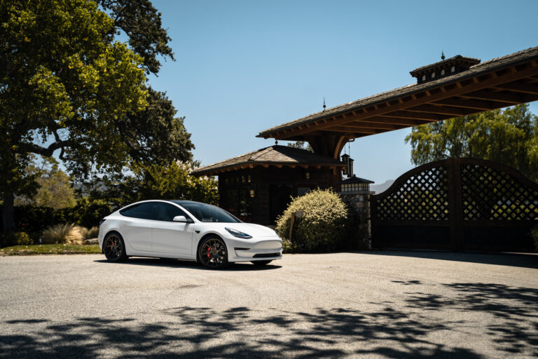 A 2019 Tesla Model 3 on 20 Inch Blaque Diamond BD-F18 Antique Matte Bronze Wheels