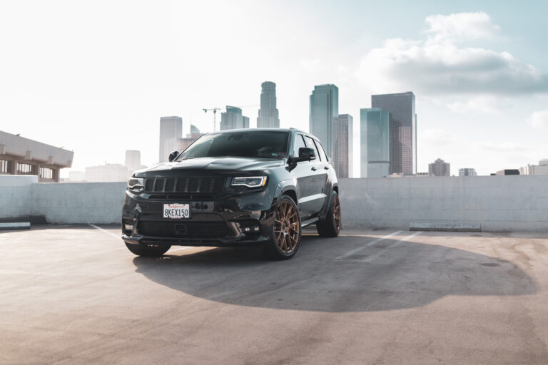 A 2020 Jeep SRT on 22 Inch Blaque Diamond Brushed Bronze Wheels