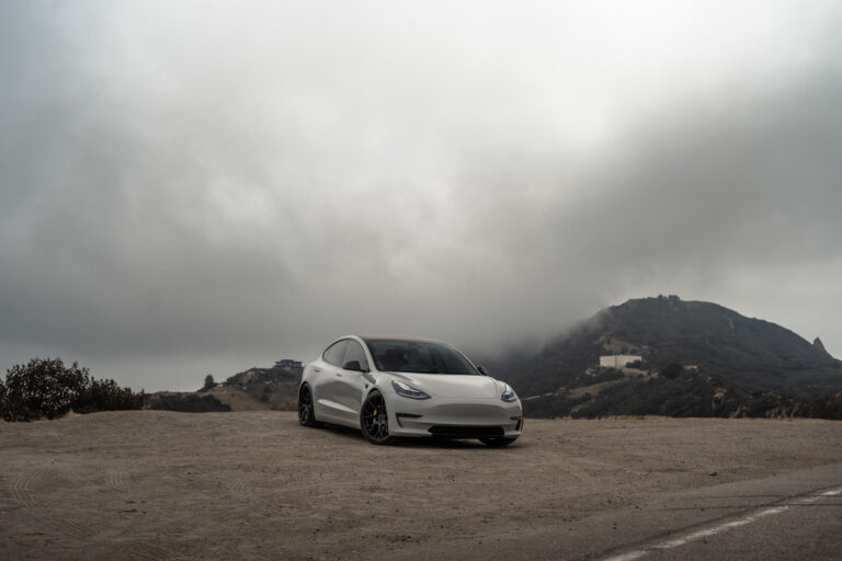 A 2020 Tesla Model 3 on 20 Inch Blaque Diamond BD-F18 Gloss Black Wheels