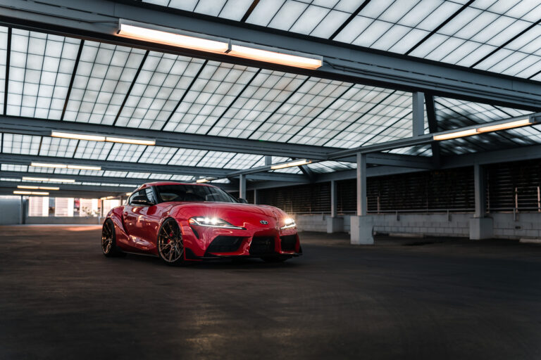 A 2020 Toyota Supra on Blaque Diamond BD-F18 Polished Bronze Little Tokyo Wheels