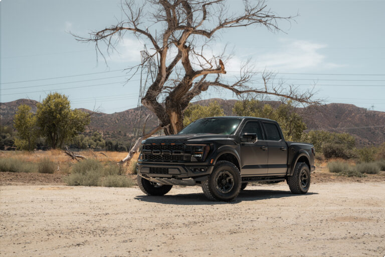 A 2022 Ford Raptor on Blaque Diamond BD-O728 Tinted Machined Black Wheels