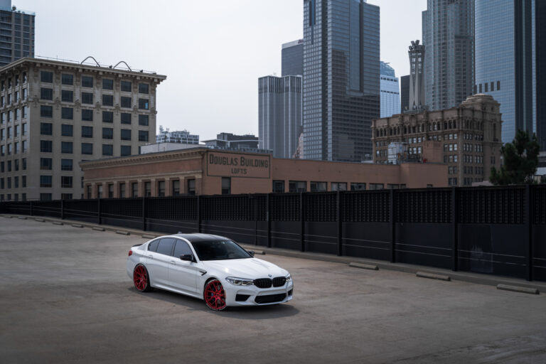 A 2020 BMW M5 Competition on Blaque Diamond BD-F18 Custom Brushed Lollipop Red Wheels