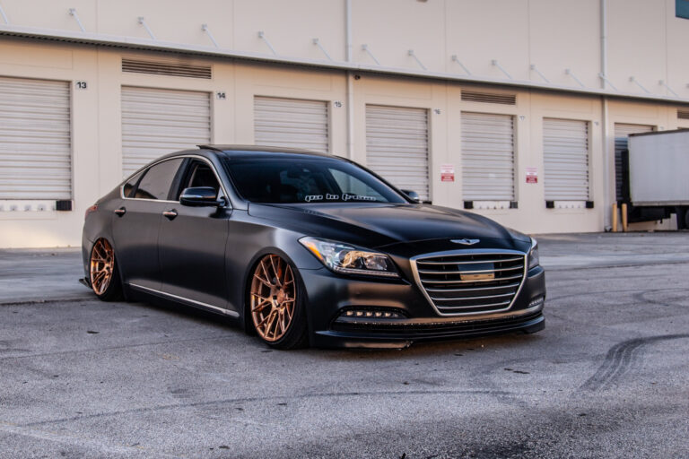 A 2016 Hyundai Genesis Sedan on Blaque Diamond BD-F18 Polished Rose Gold Wheels