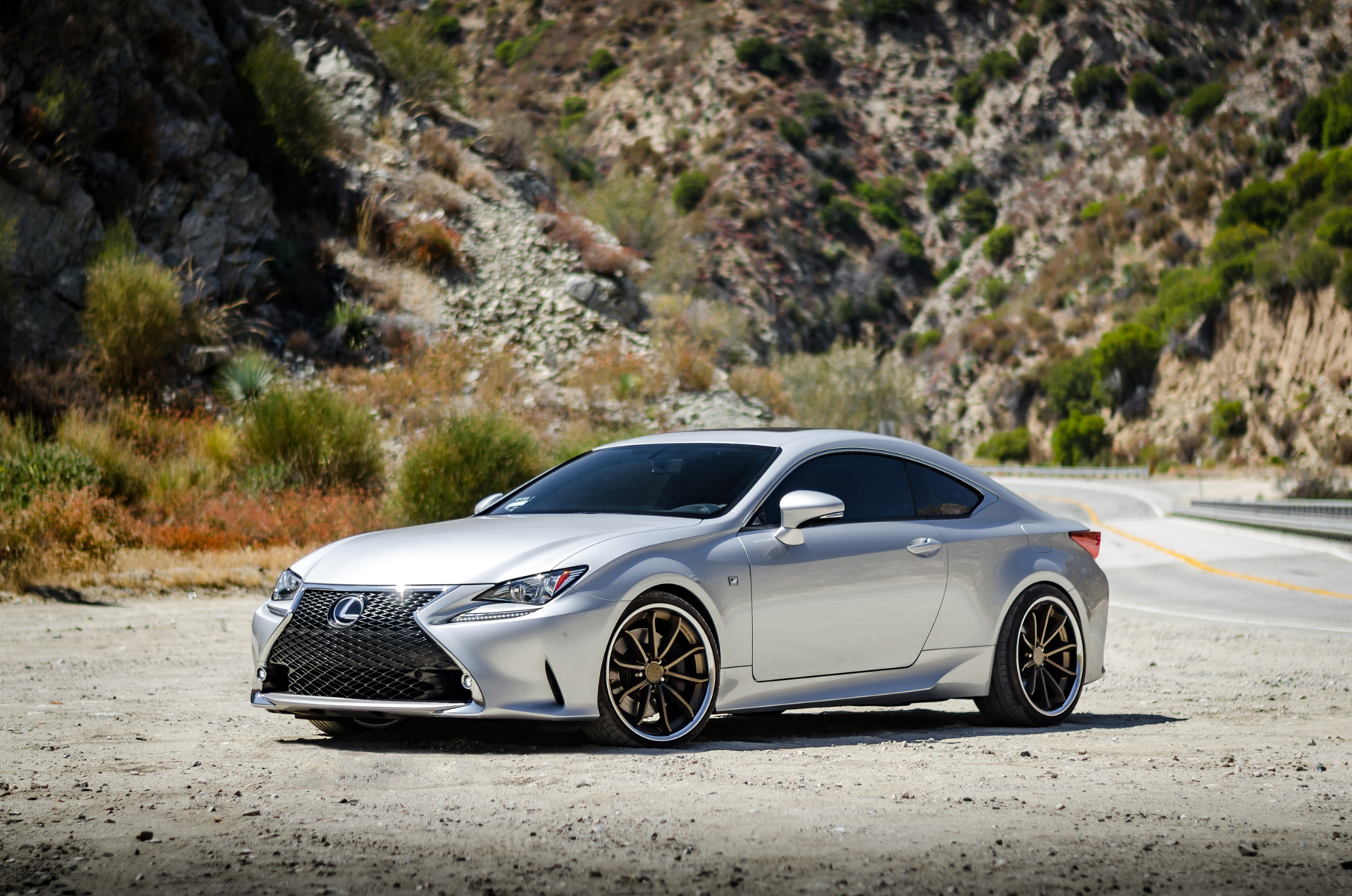 A 2015 Lexus RC350 on Blaque Diamond BD-23 Bronze with Chrome Lip Wheels