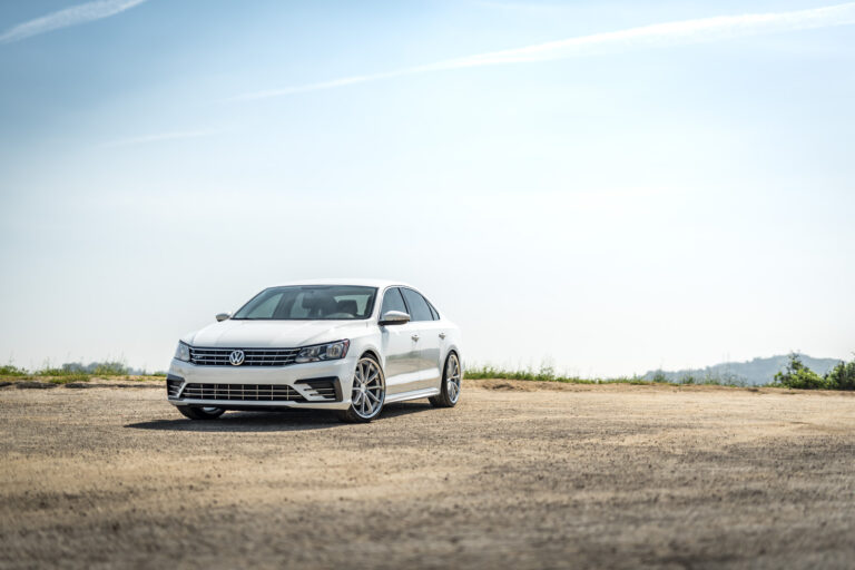 A 2016 VW Passat R Line on Blaque Diamond BD-23 Silver with Chrome Lip Wheels