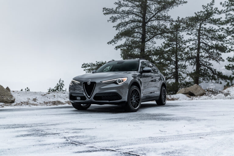 A 2018 Alfa Romeo Stelvio on Blaque Diamond BD-17 Matte Black with Black Chrome Wheels