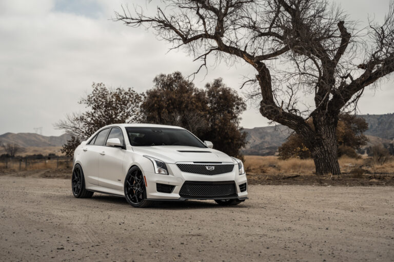 A 2018 Cadillac ATS V Coupe on Blaque Diamond BD-F25 Gloss Black Wheels