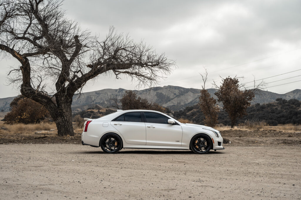 A 2018 Cadillac ATS V Coupe on Blaque Diamond BD-F25 Gloss Black Wheels