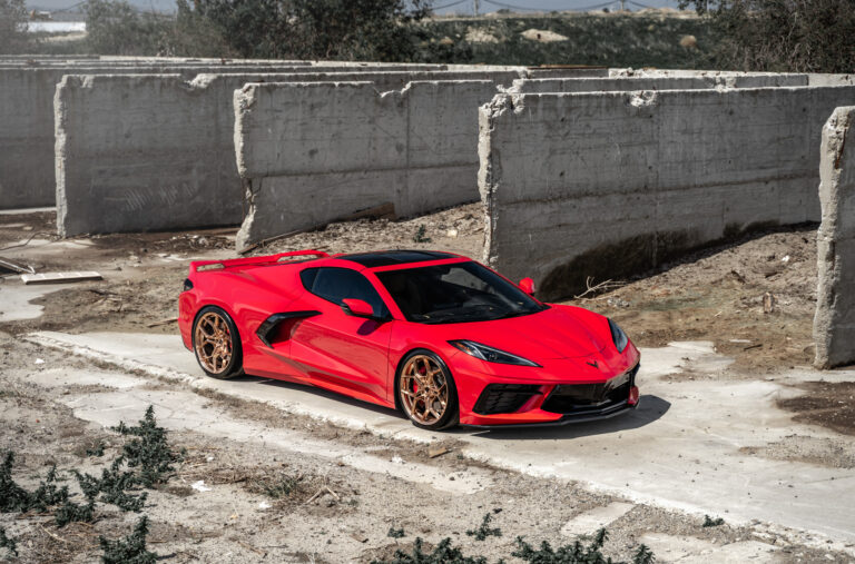 A 2020 Chevrolet Corvette C8 on Blaque Diamond BD-F25 Custom Polished Rose Gold Wheels