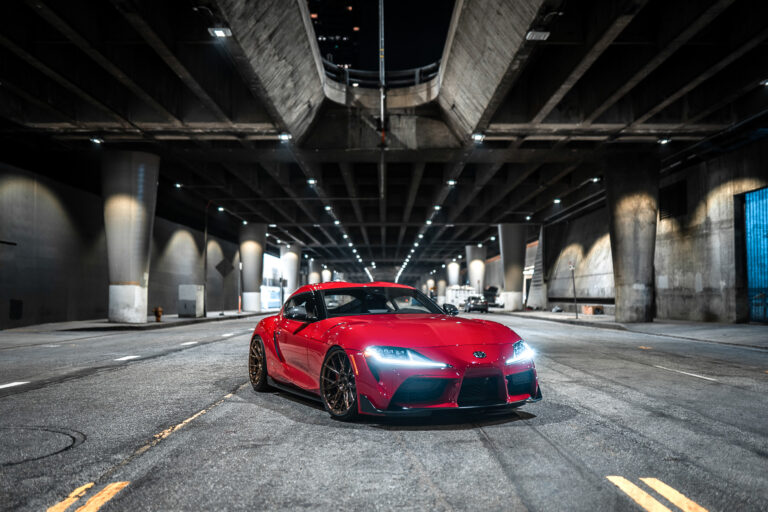 A 2020 Toyota Supra on Blaque Diamond BD-F18 20 Inch Polished Bronze Wheels