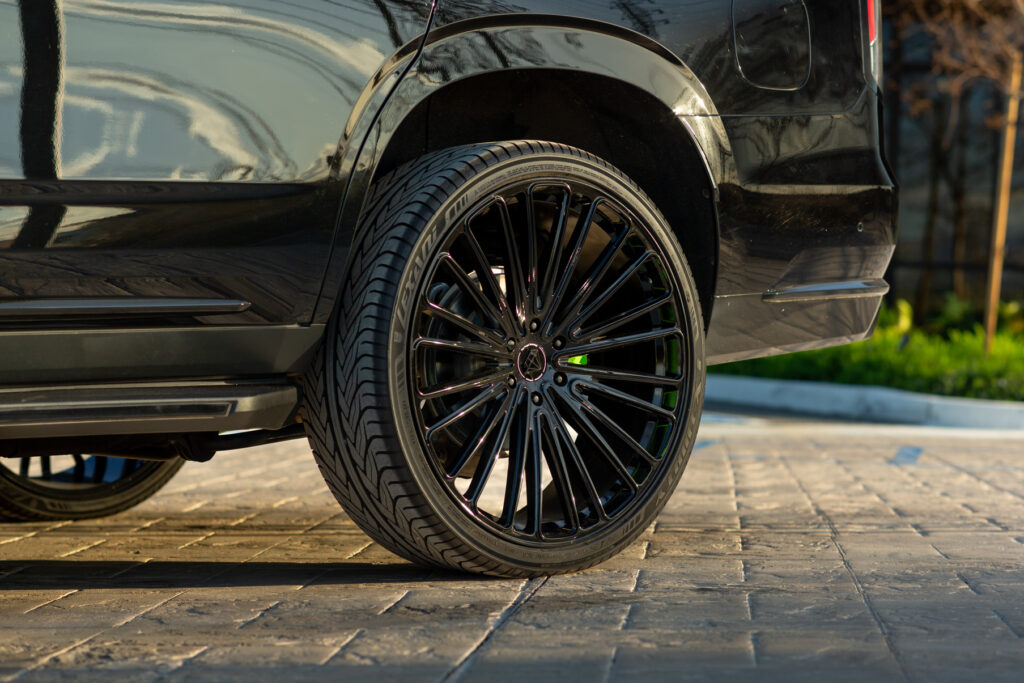 A Black 2021 Cadillac Escalade 600 on 22 Inch Blaque Diamond BD-715 Gloss Black Wheels