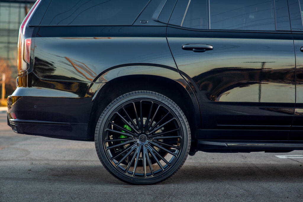 A Black 2021 Cadillac Escalade 600 on 22 Inch Blaque Diamond BD-715 Gloss Black Wheels