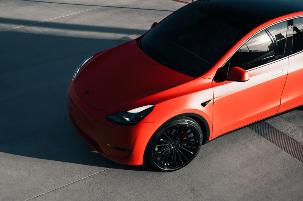 A Matte Red 2022 Tesla Model Y on Blaque Diamond BD-715 Gloss Black Wheels