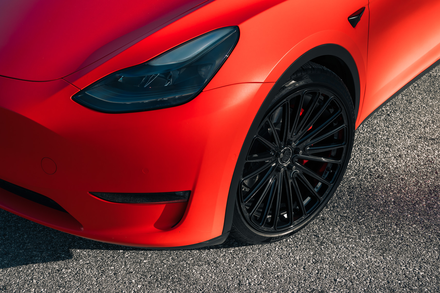 A Matte Red 2022 Tesla Model Y on Blaque Diamond BD-715 Gloss Black Wheels