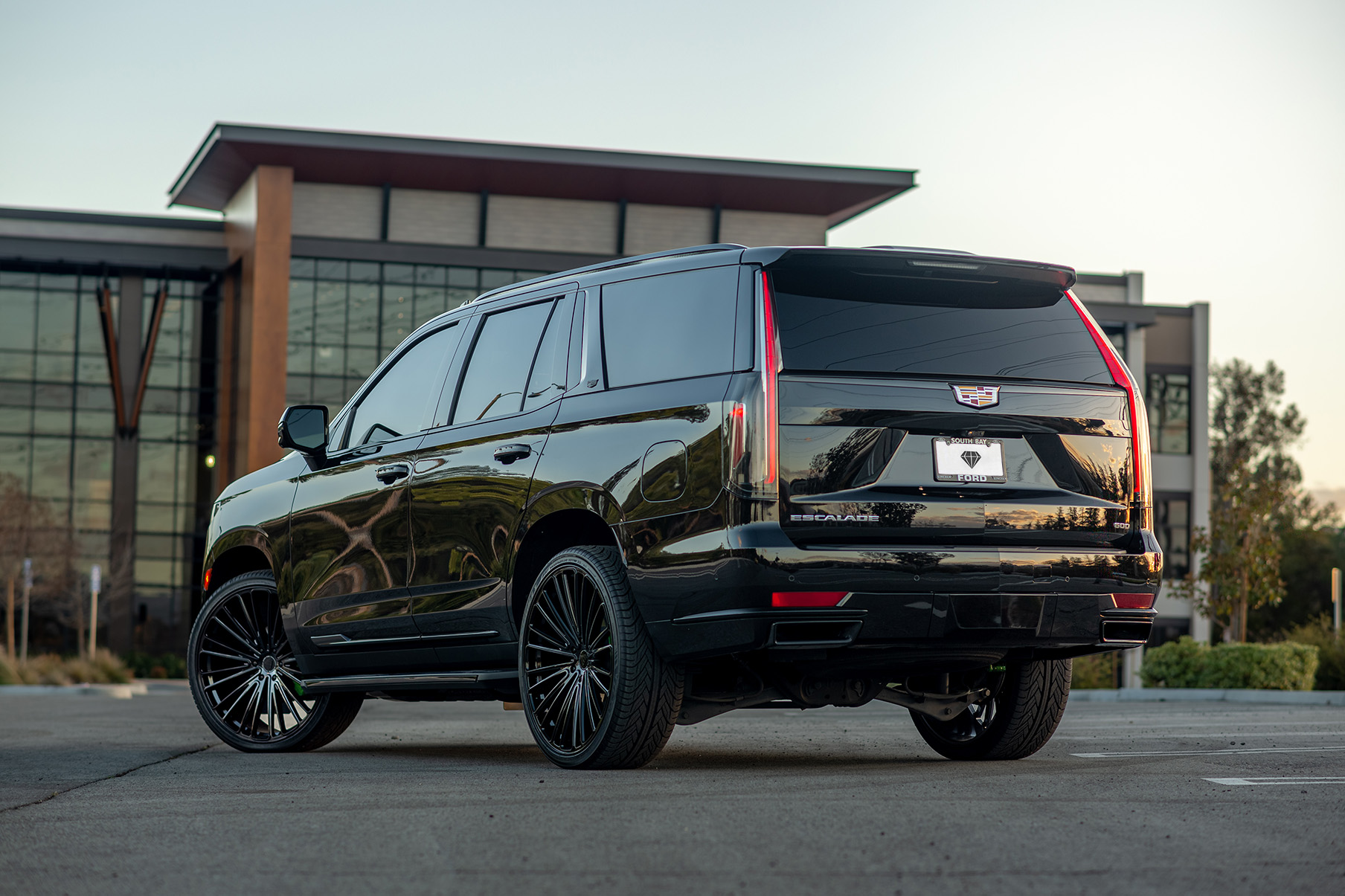 A Black 2021 Cadillac Escalade 600 on 22 Inch Blaque Diamond BD-715 Wheels in Gloss Black