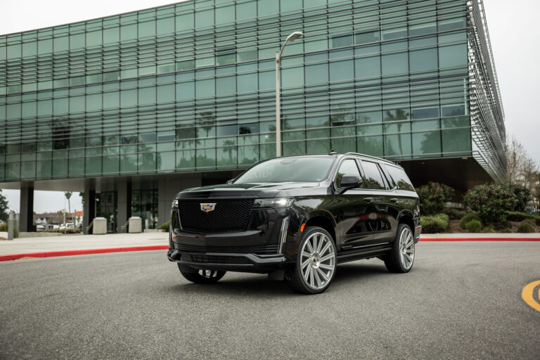 A 2022 Cadillac Escalade on Blaque Diamond BD-40 Brushed Silver Wheel with Floating Cap