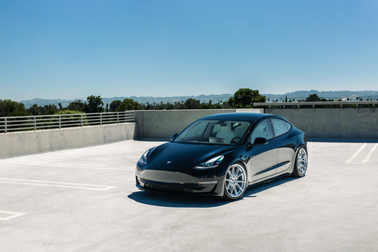 A 2022 Tesla Model 3 with Blaque Diamond BD-F29 Brushed Silver Wheels